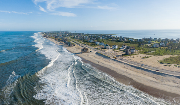 Located at the end of North Carolina Highway 12, Hatteras Island is a wonderful place. To drive here, you’ll pass Cape Hatteras National Seashore and the hills where the Wright brothers took their first flights.