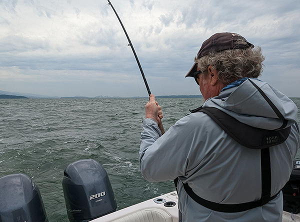 If you are fishing alone in the cold, avoid activities like trolling or anchoring in deep water with a strong current running, because if you fall overboard, there is little chance of reaching the boat to get back aboard.