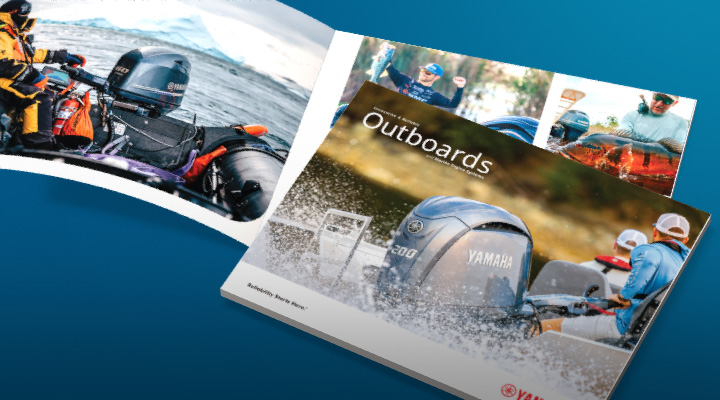 Yamaha Outboards catalog cover featuring a Yamaha outboard motor splashing water, next to an open brochure spread with anglers and fishing photos.