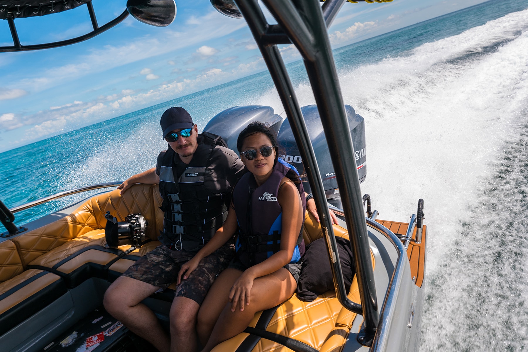 Man and woman riding in a boat